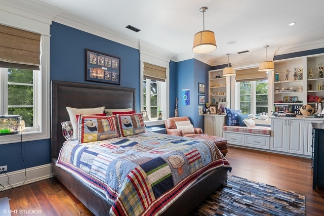 145 Oxford Road Kenilworth, IL 60043 - Photo 43 of 66 a bedroom with bed and a large window