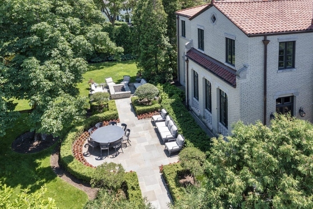 145 Oxford Road Kenilworth, IL 60043 - Photo 59 of 66 a view of an house with backyard space and balcony