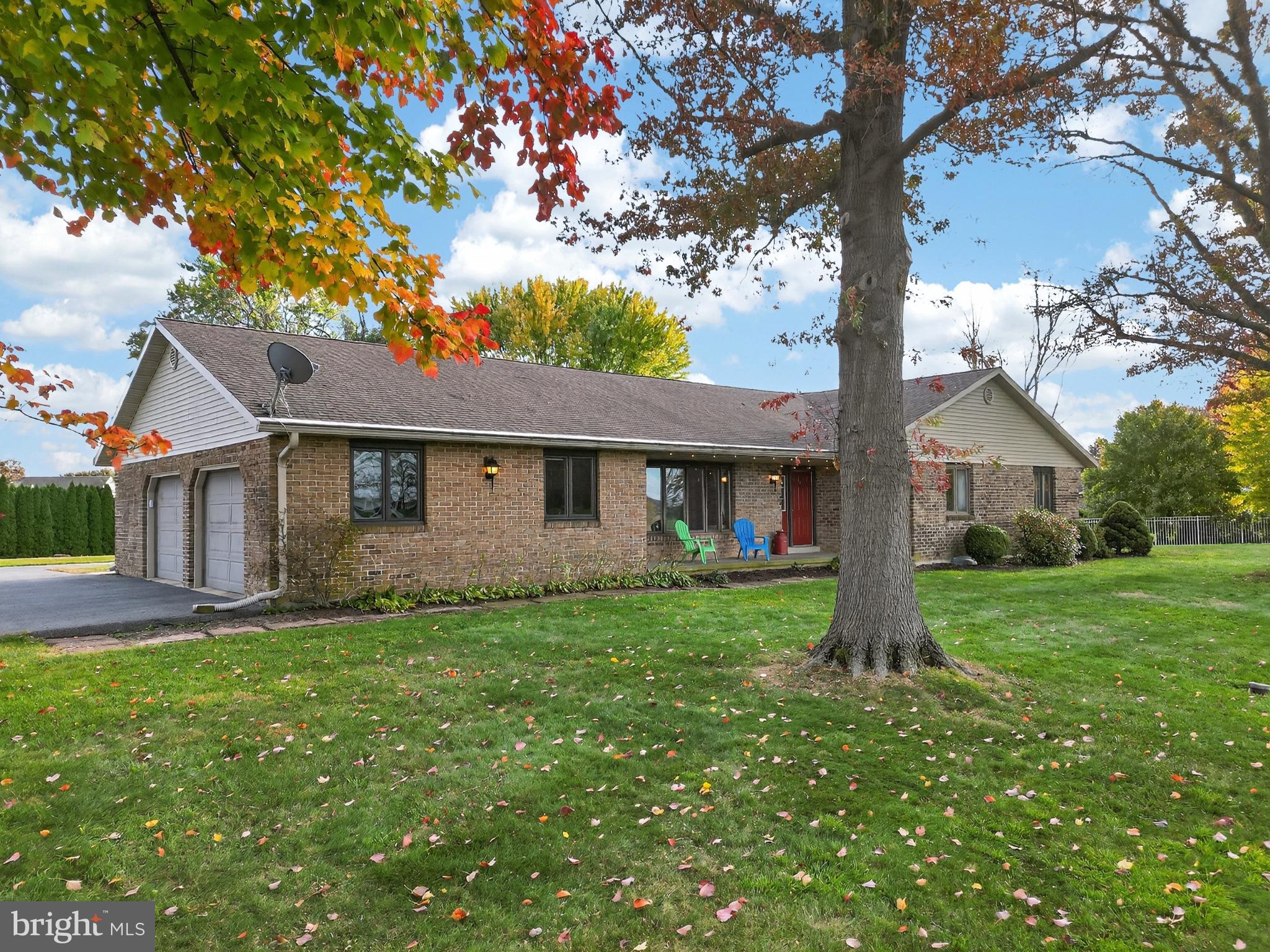 740 Lincoln Gardens Road Ephrata, PA 17522 - Photo 12 of 72 Charming brick home with vibrant foliage.