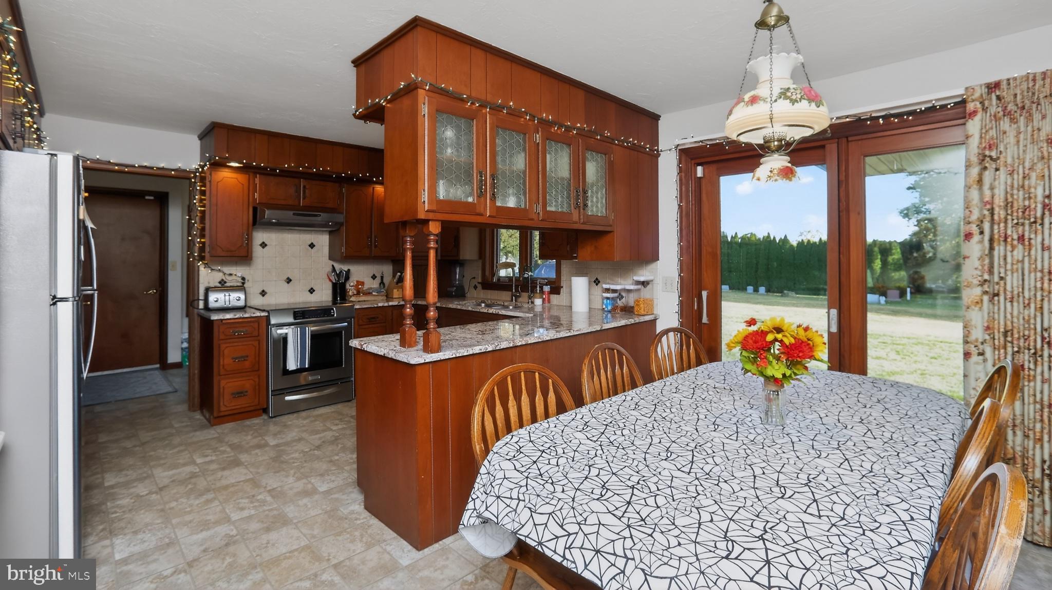 740 Lincoln Gardens Road Ephrata, PA 17522 - Photo 17 of 72 a view of a dining room with furniture chandelier and a chandelier