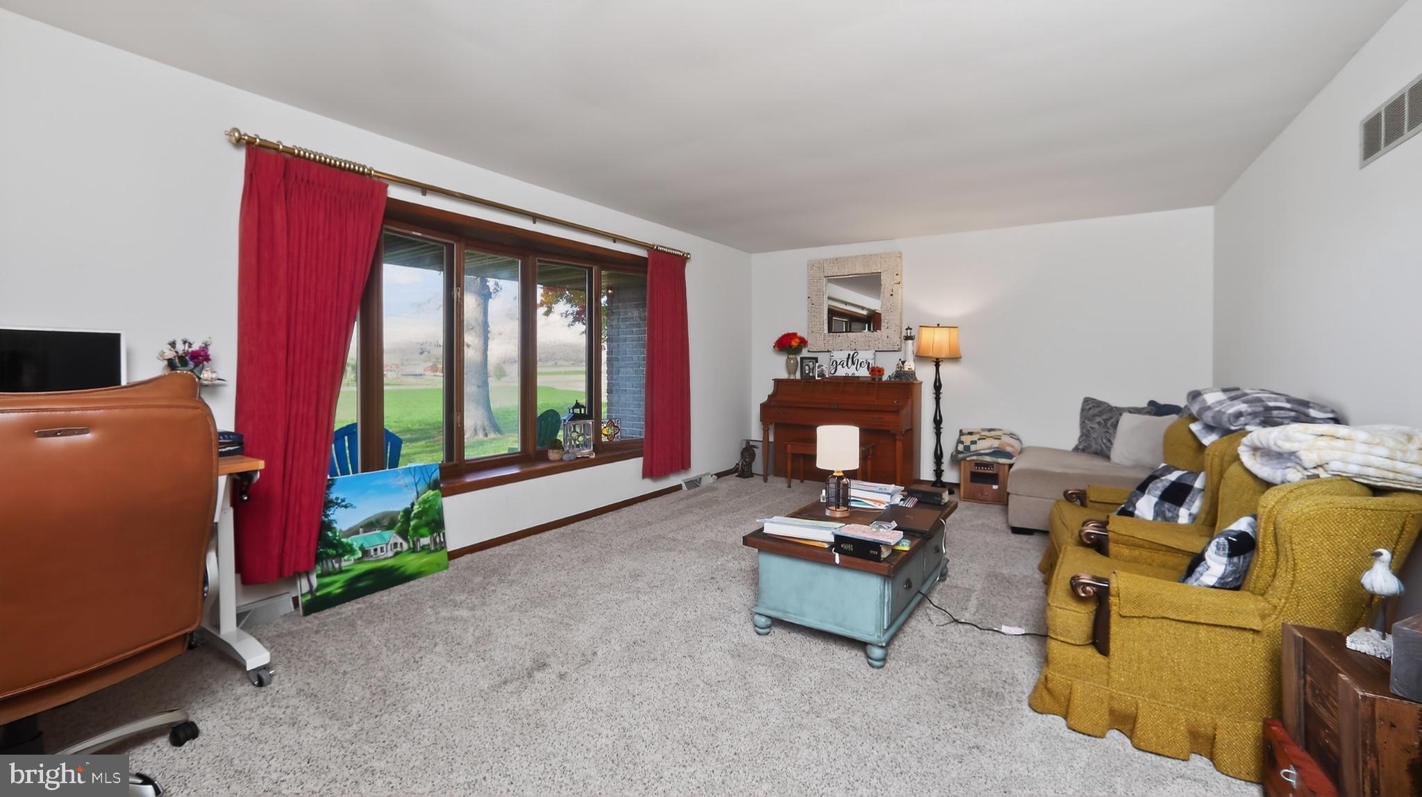 740 Lincoln Gardens Road Ephrata, PA 17522 - Photo 26 of 72 a living room with furniture and a window