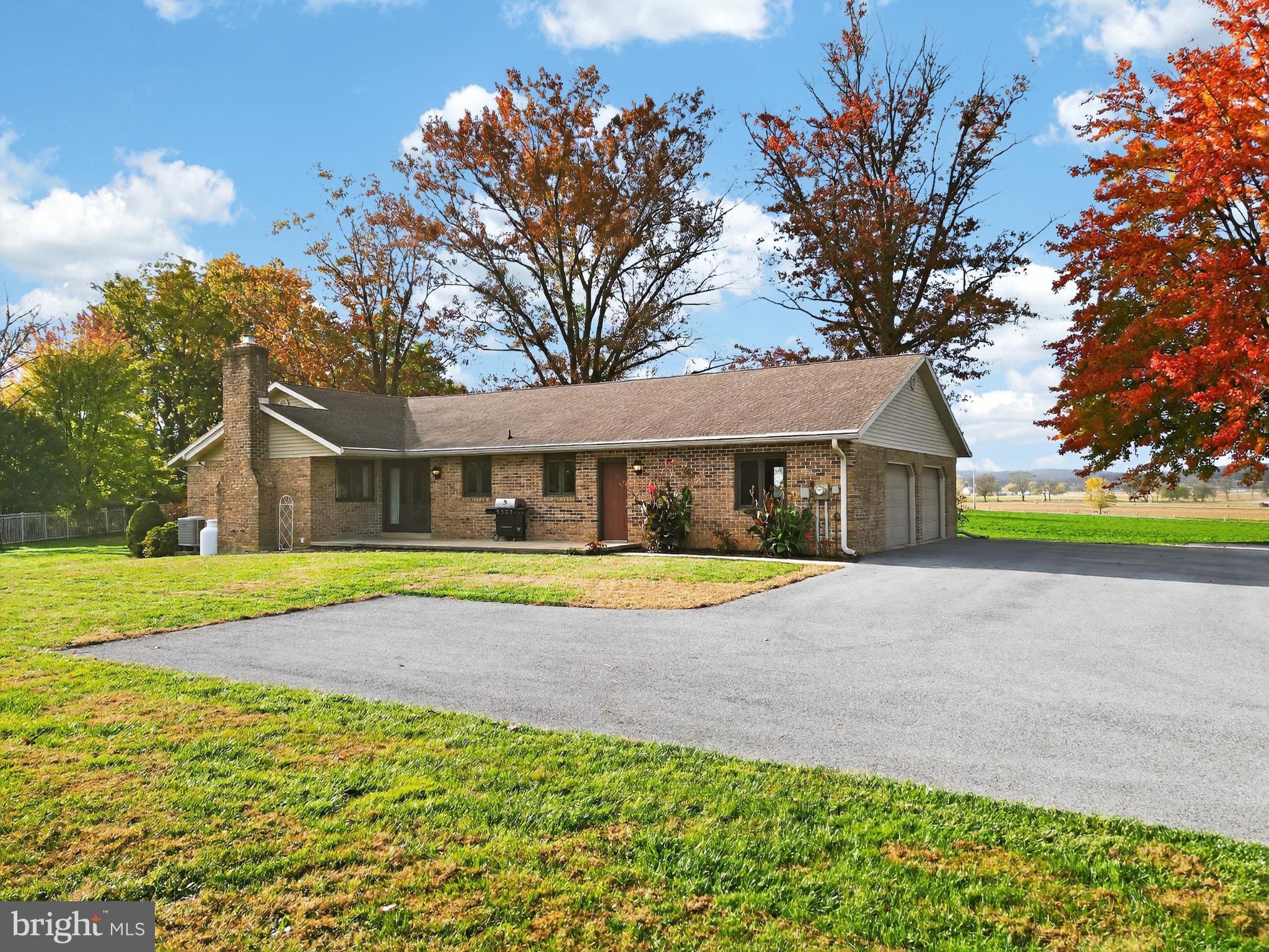 740 Lincoln Gardens Road Ephrata, PA 17522 - Photo 4 of 72 a front view of house with yard and swimming pool
