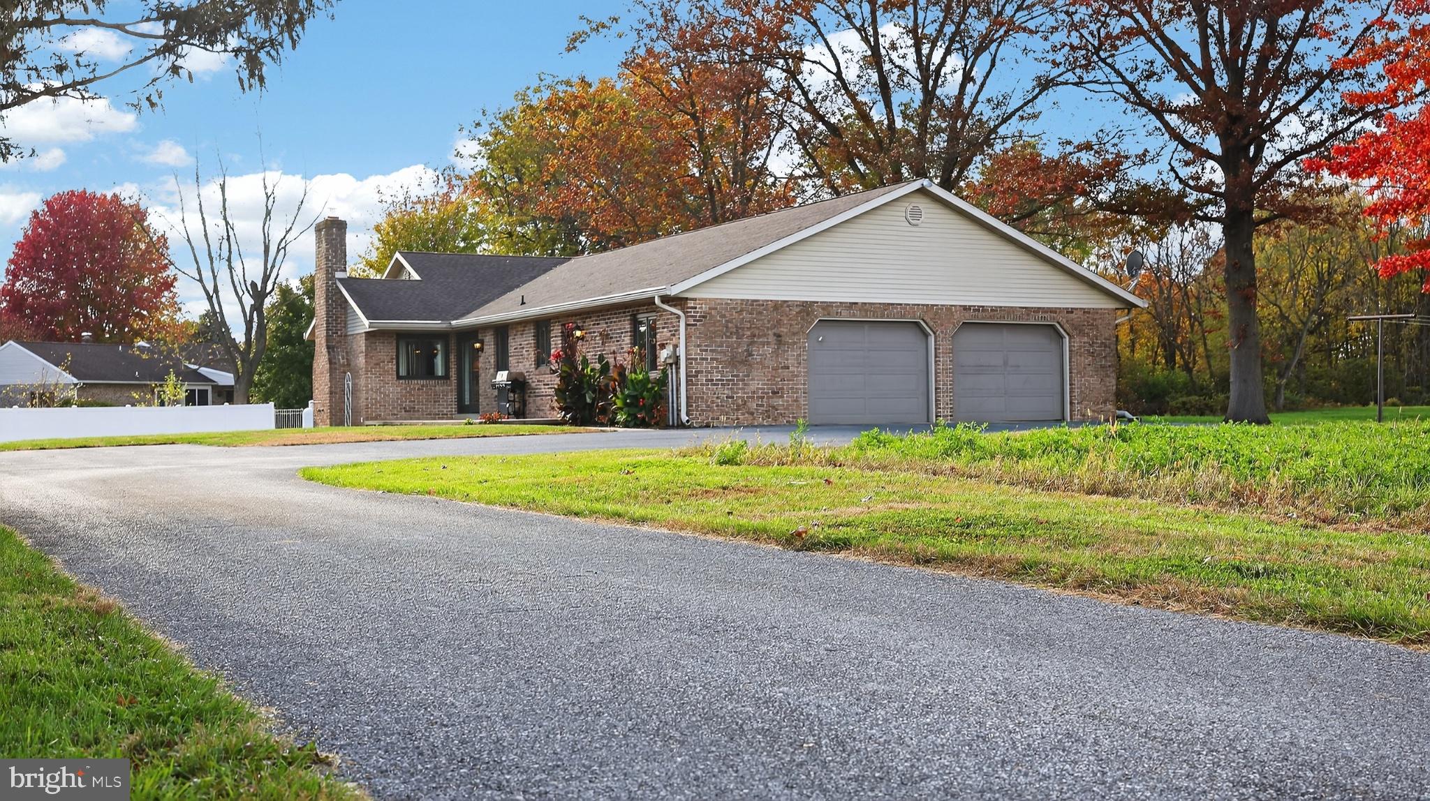 740 Lincoln Gardens Road Ephrata, PA 17522 - Photo 60 of 72 a view of a house with a yard and large trees