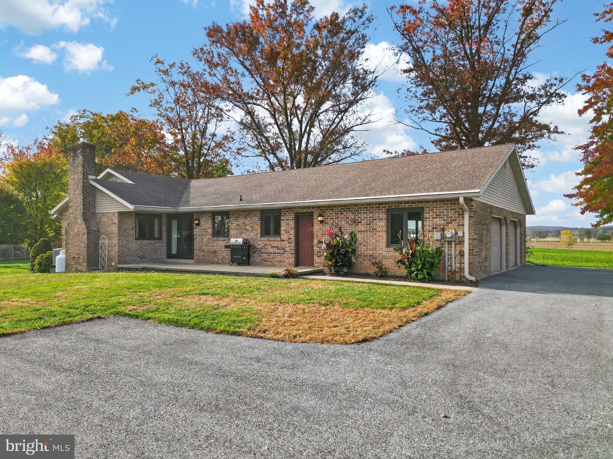 740 Lincoln Gardens Road Ephrata, PA 17522 - Photo 6 of 72 a front view of a house with a yard and porch