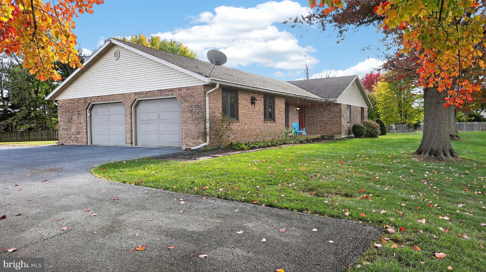 740 Lincoln Gardens Road Ephrata, PA 17522 - Photo 62 of 72 Charming brick home with vibrant foliage.