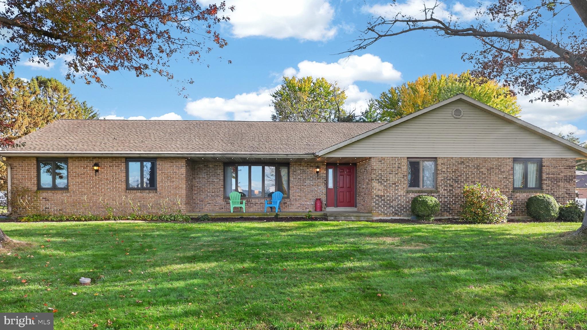 740 Lincoln Gardens Road Ephrata, PA 17522 - Photo 65 of 72 a front view of a house with a yard and garage