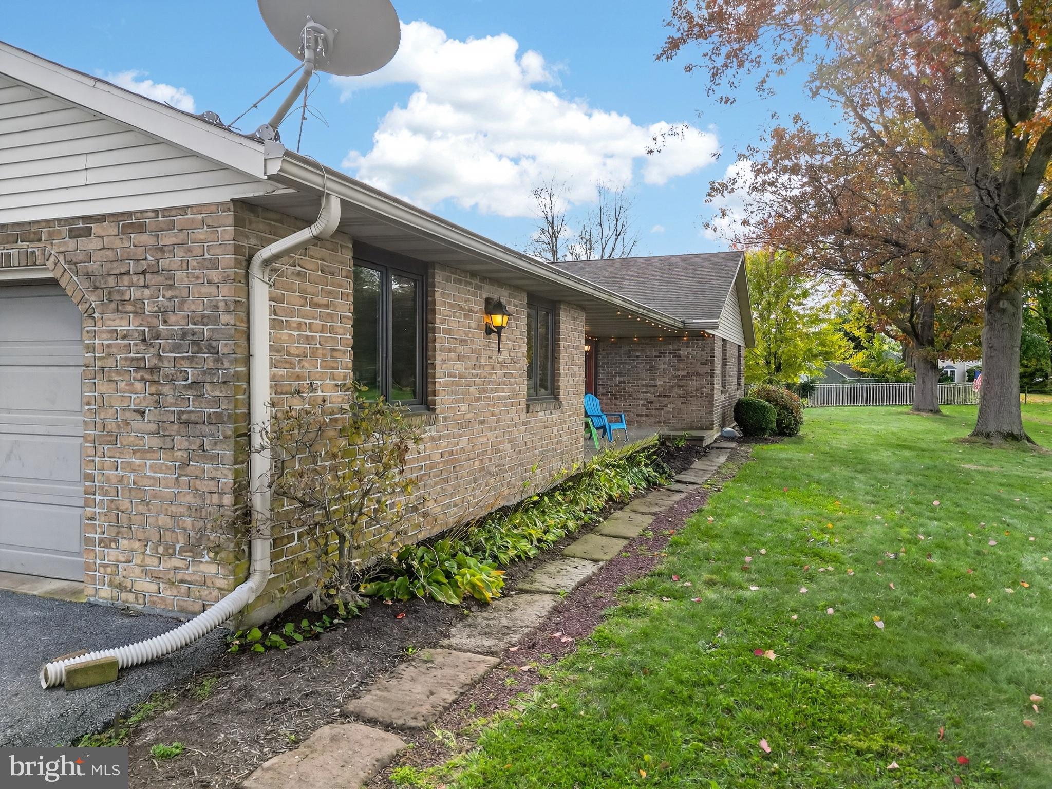 740 Lincoln Gardens Road Ephrata, PA 17522 - Photo 8 of 72 a front view of a house with garden