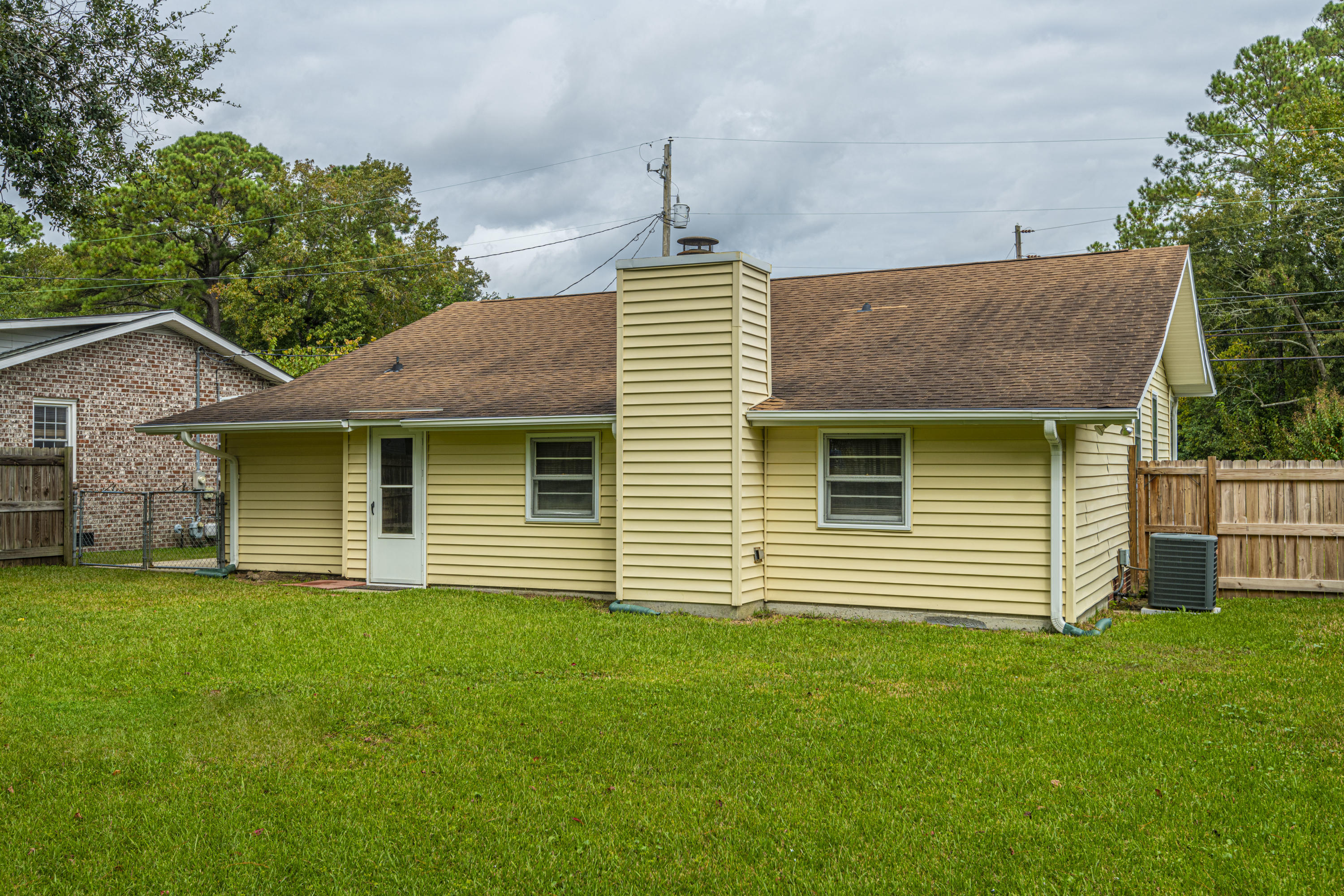 5925 Maple Street Hanahan, SC 29410 - Photo 25 of 32 rear of home