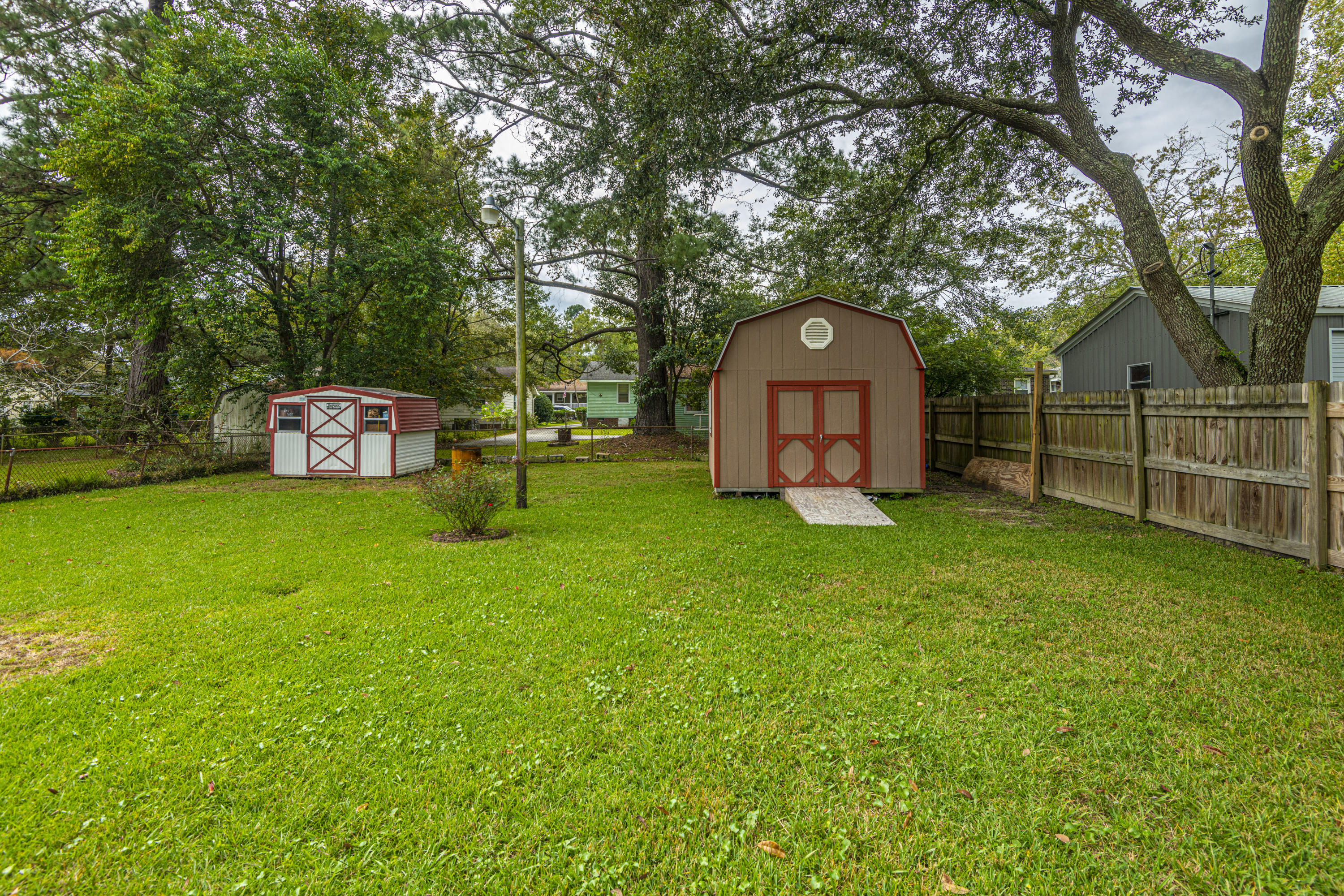 5925 Maple Street Hanahan, SC 29410 - Photo 28 of 32 backyard with 2 sheds!