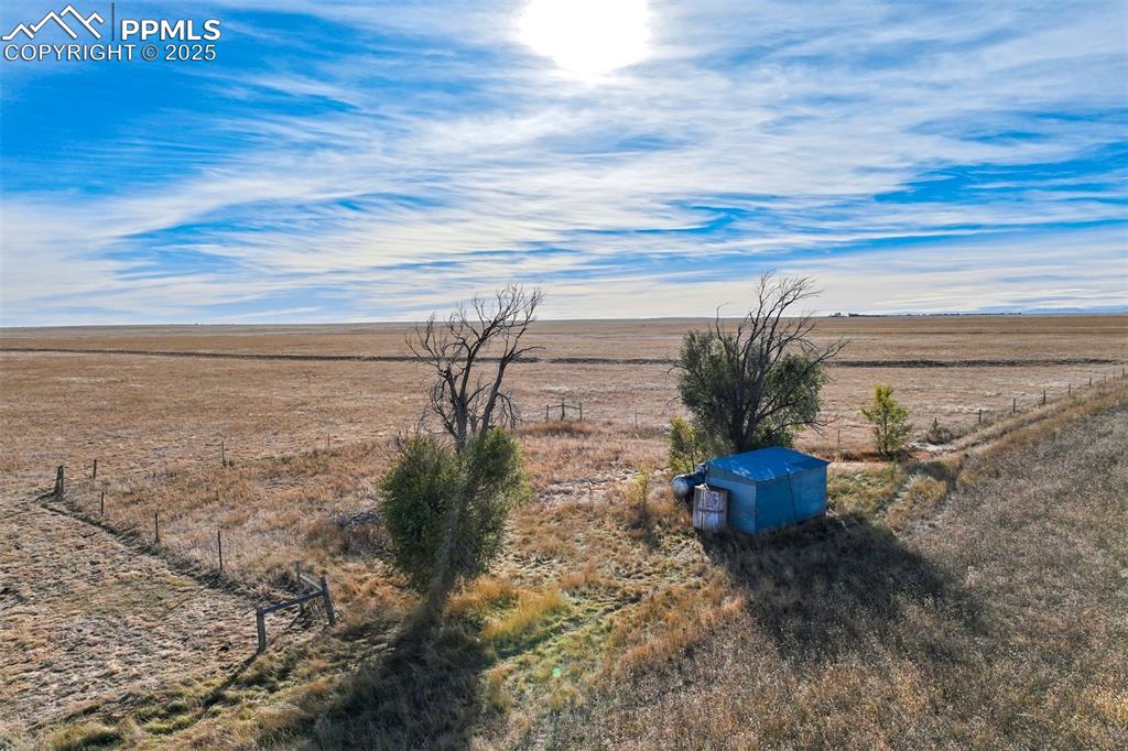 Corona Road Rush, CO 80833 - Photo 17 of 25 a view of a backyard with plants and ocean view