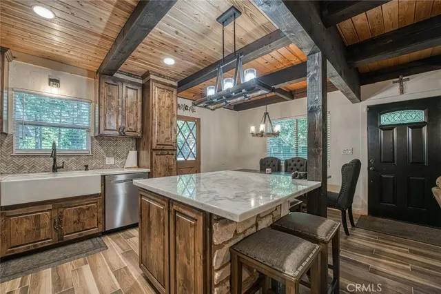 a kitchen with a table and chairs