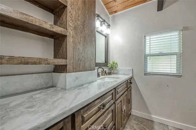 a view of outdoor space with wooden floor