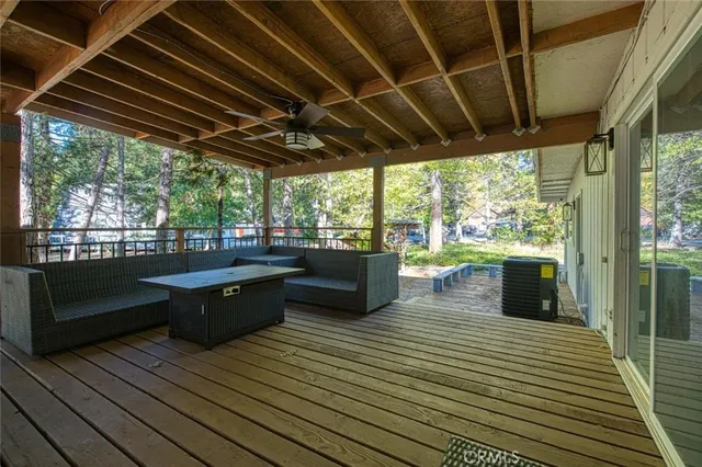 a view of a patio filled with furniture
