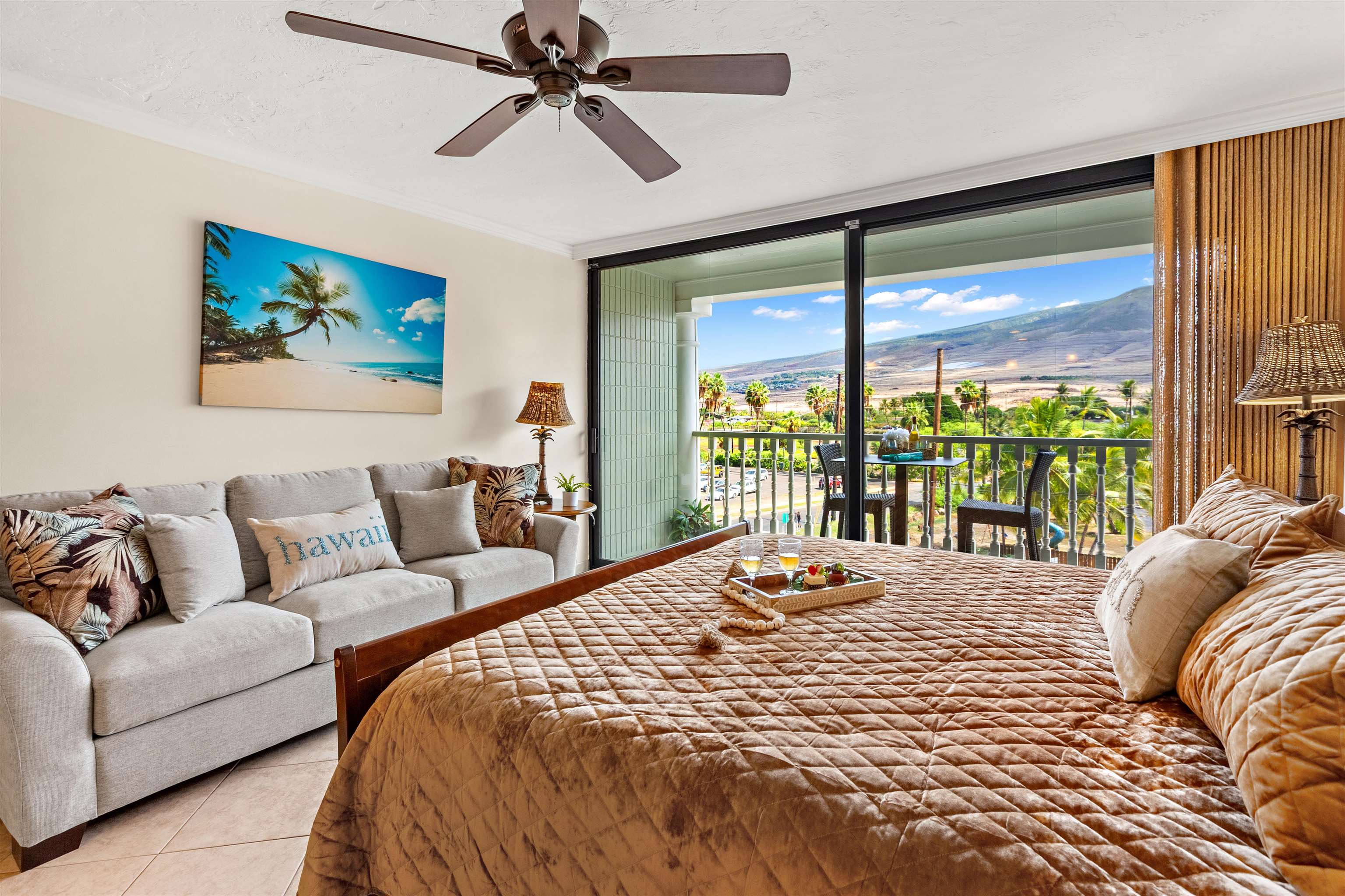 475 Front Street, Unit 430 Lahaina, HI 96761 - Photo 1 of 19 a bedroom with a large bed and a large window