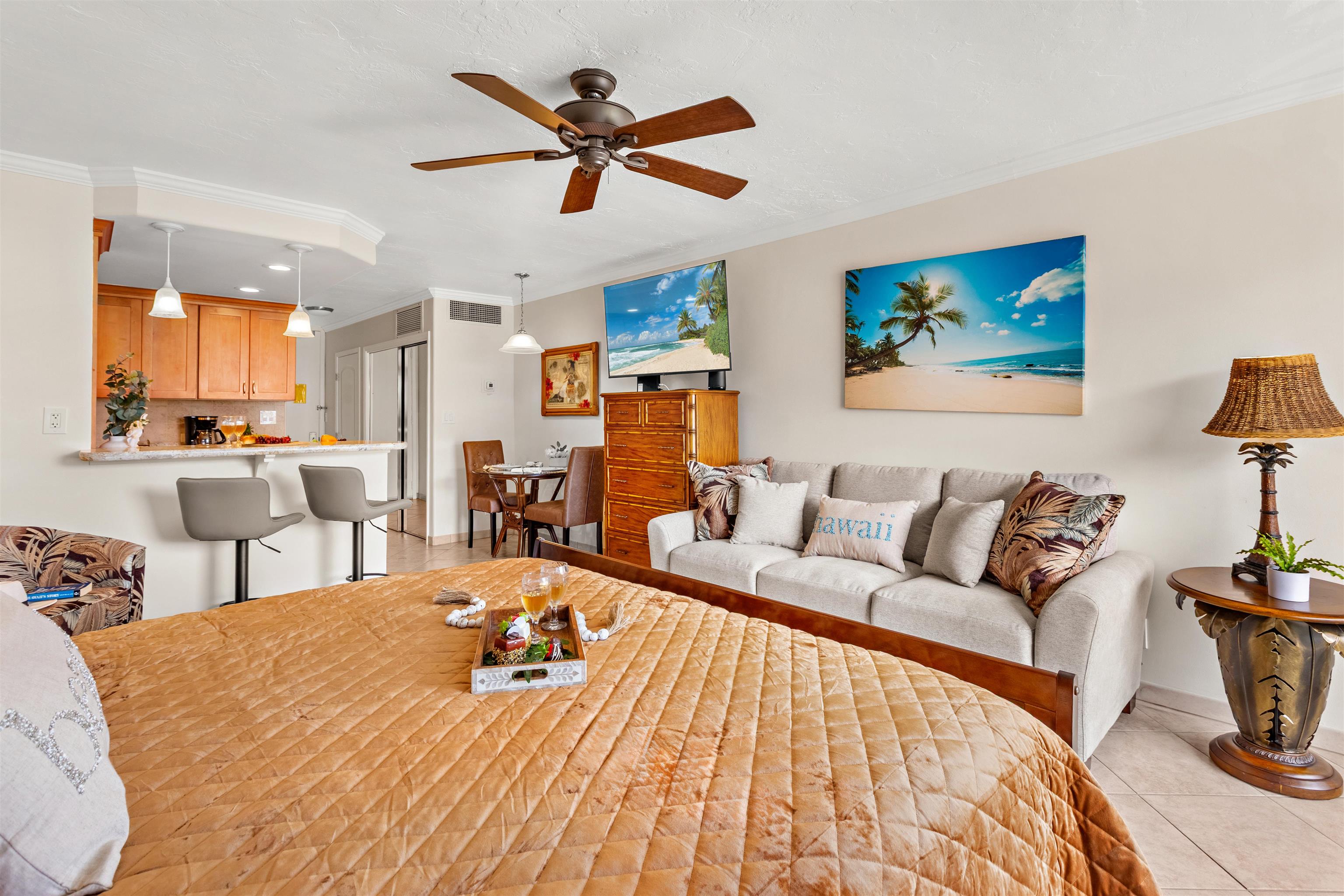 475 Front Street, Unit 430 Lahaina, HI 96761 - Photo 15 of 19 a living room with furniture and a chandelier