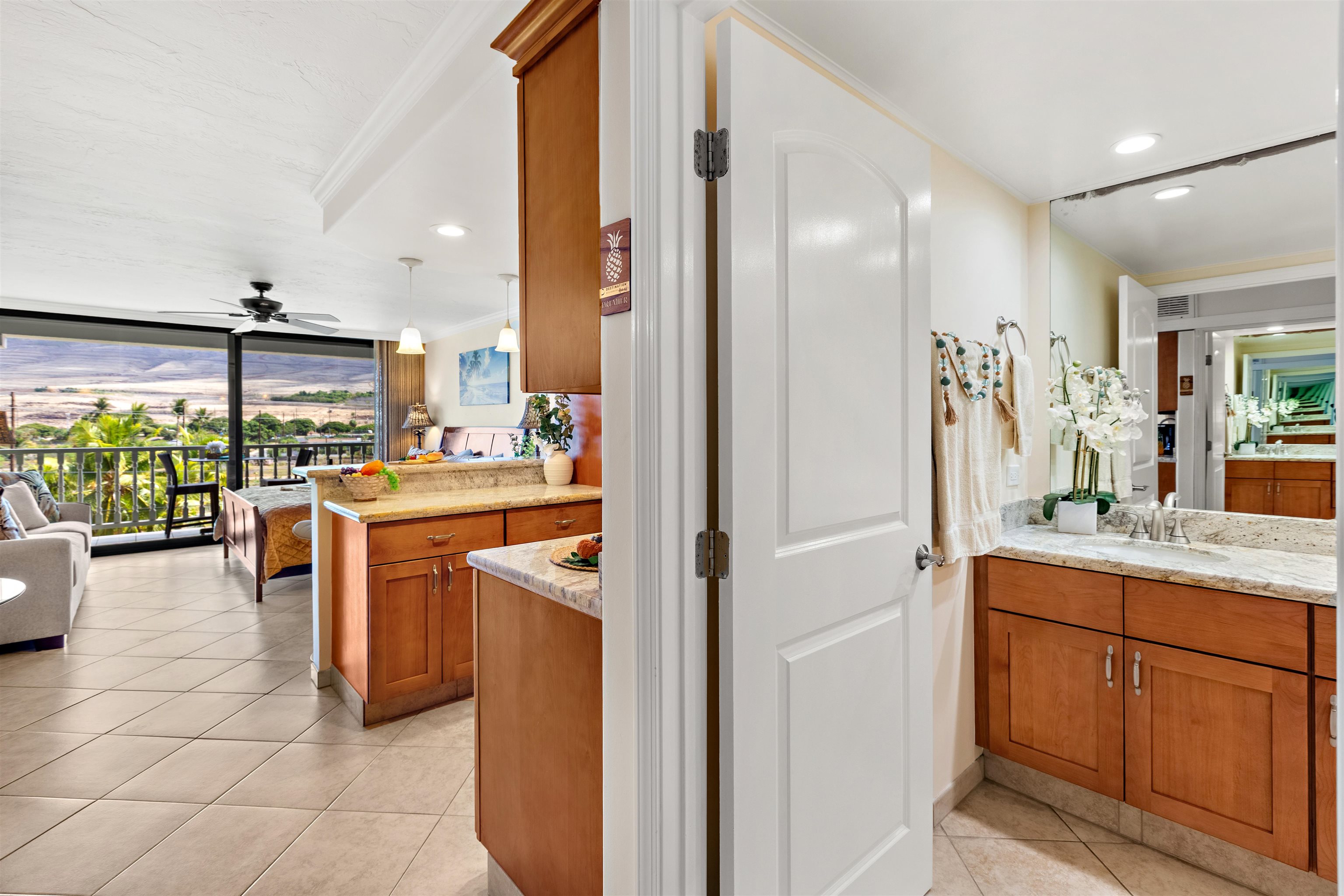 475 Front Street, Unit 430 Lahaina, HI 96761 - Photo 19 of 19 a kitchen with stainless steel appliances granite countertop a refrigerator and a sink