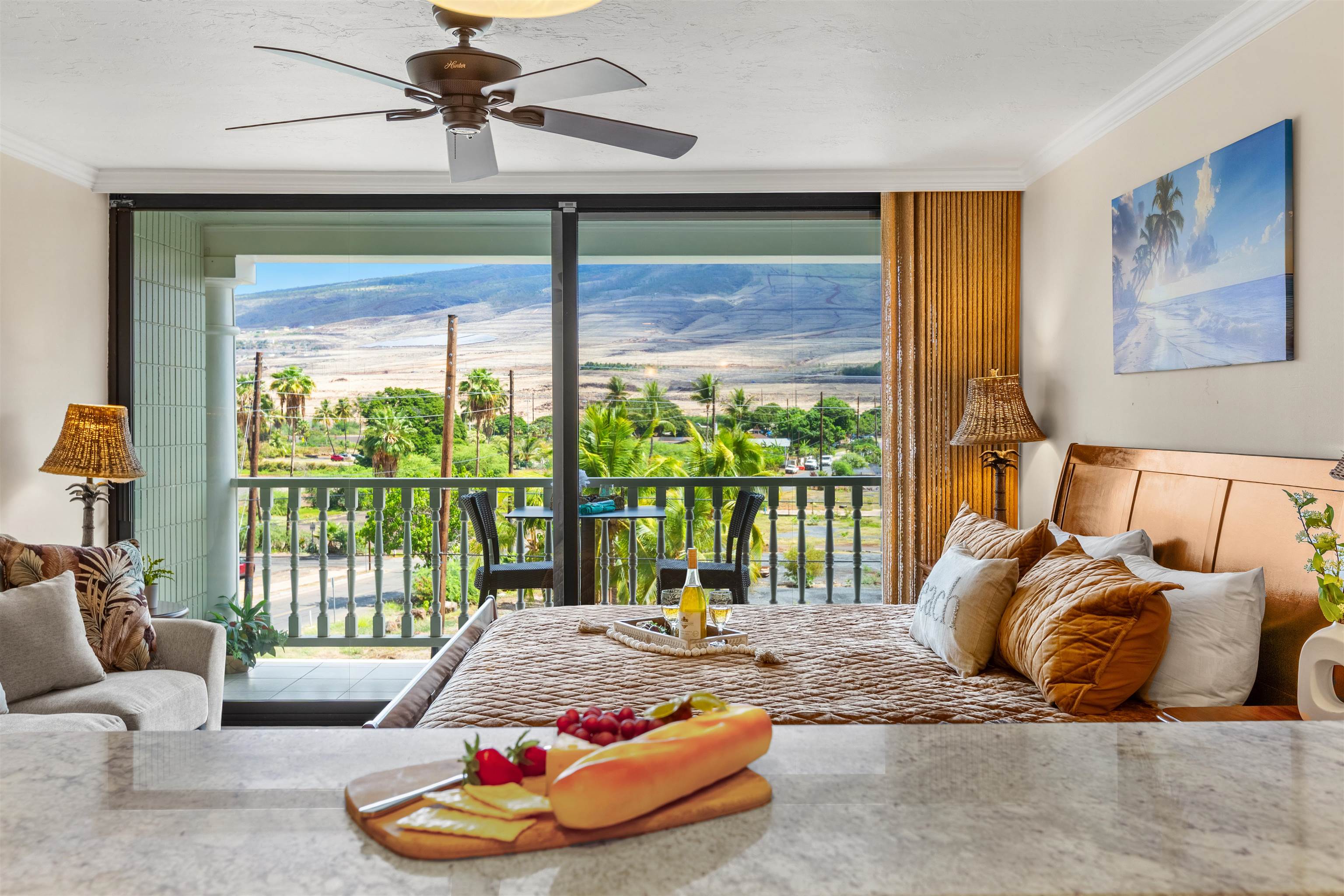 475 Front Street, Unit 430 Lahaina, HI 96761 - Photo 2 of 19 a bedroom with furniture and a large window
