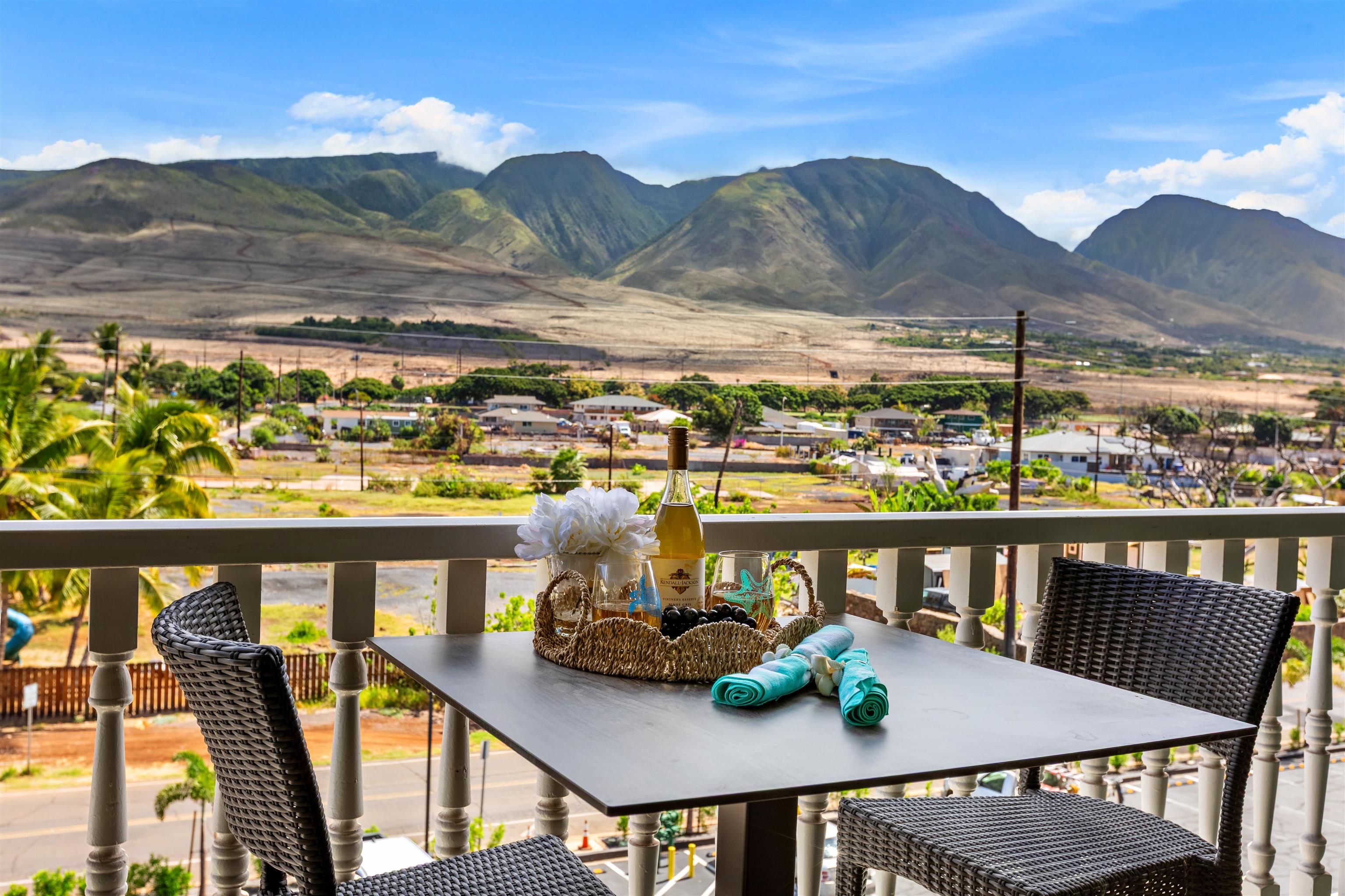 475 Front Street, Unit 430 Lahaina, HI 96761 - Photo 5 of 19 a view of a chairs and table on the terrace