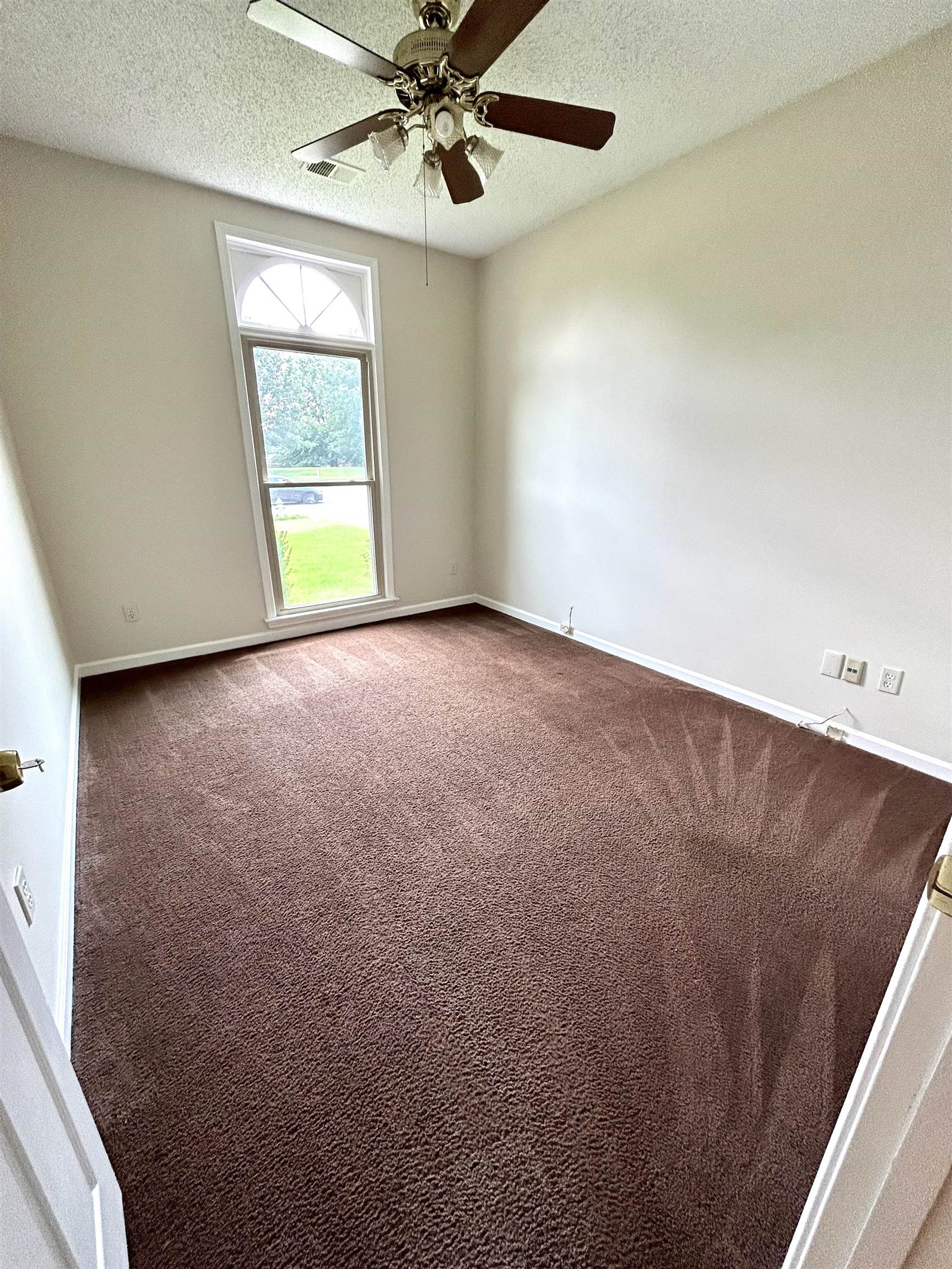8528 Trinity Road Memphis, TN 38018 - Photo 14 of 21 a view of an empty room with a window