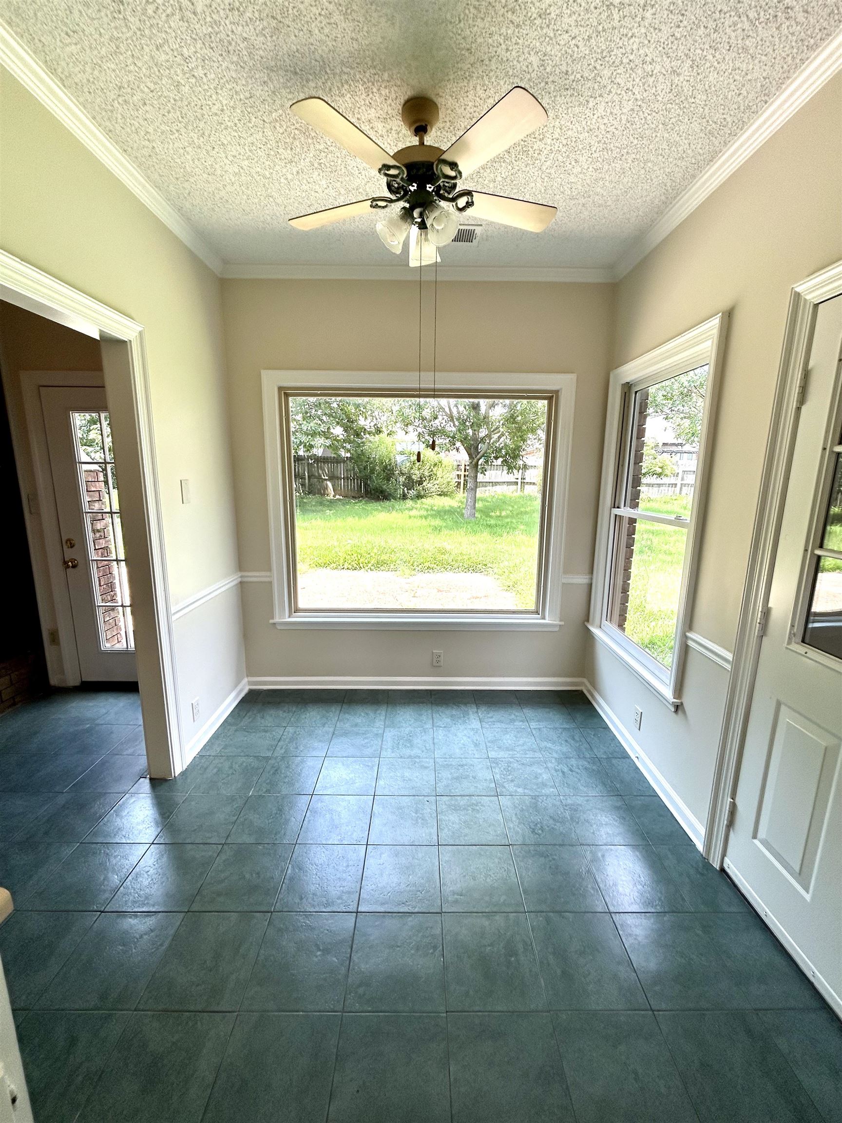 8528 Trinity Road Memphis, TN 38018 - Photo 8 of 21 a view of an empty room with a window
