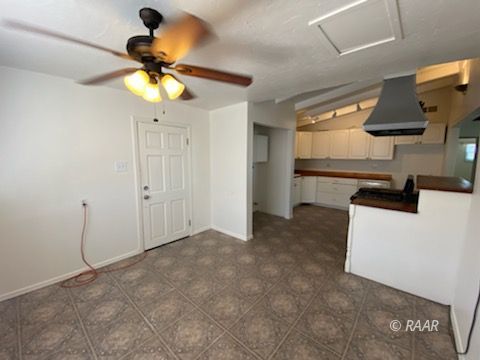 301 North Florence Street Ridgecrest, CA 93555 - Photo 14 of 33 a very nice looking room with a ceiling fan
