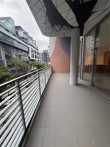 a bathroom with a double vanity sink toilet and shower