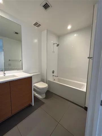 a view of a terrace with seating area