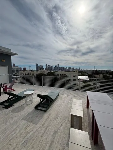 a bathroom with a toilet a sink and a mirror