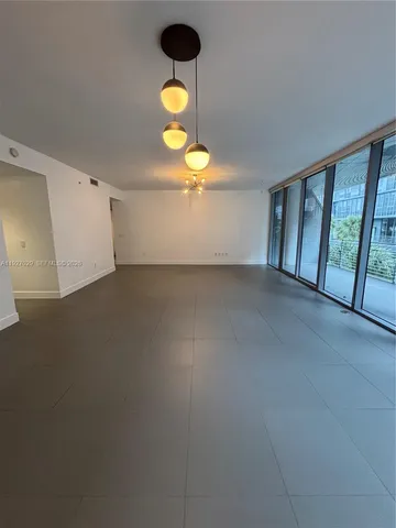 a view of a room with a window