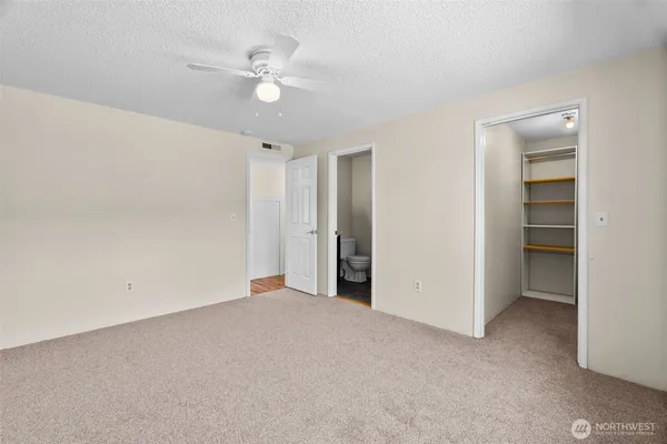 a view of an empty walk in closet