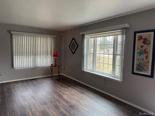 31056 Richert Street, Unit 8 Fraser, MI 48026 - Photo 6 of 19 Living Room with lots of light, newer flooring, newer windows