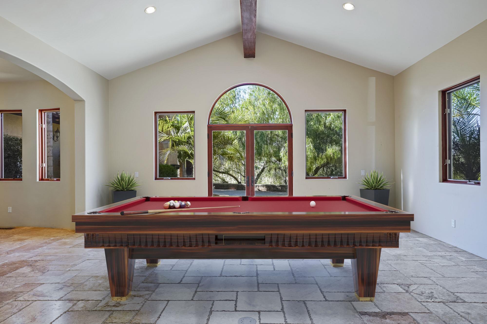 5352 Camino Jasmine Bonsall, CA 92003 - Photo 14 of 68 a room with pool table and windows
