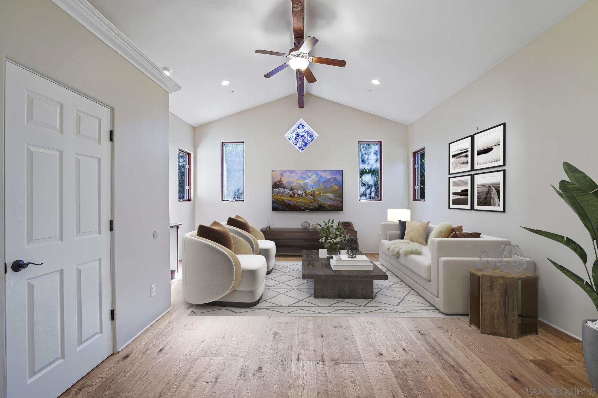 5352 Camino Jasmine Bonsall, CA 92003 - Photo 17 of 68 a living room with furniture and a flat screen tv
