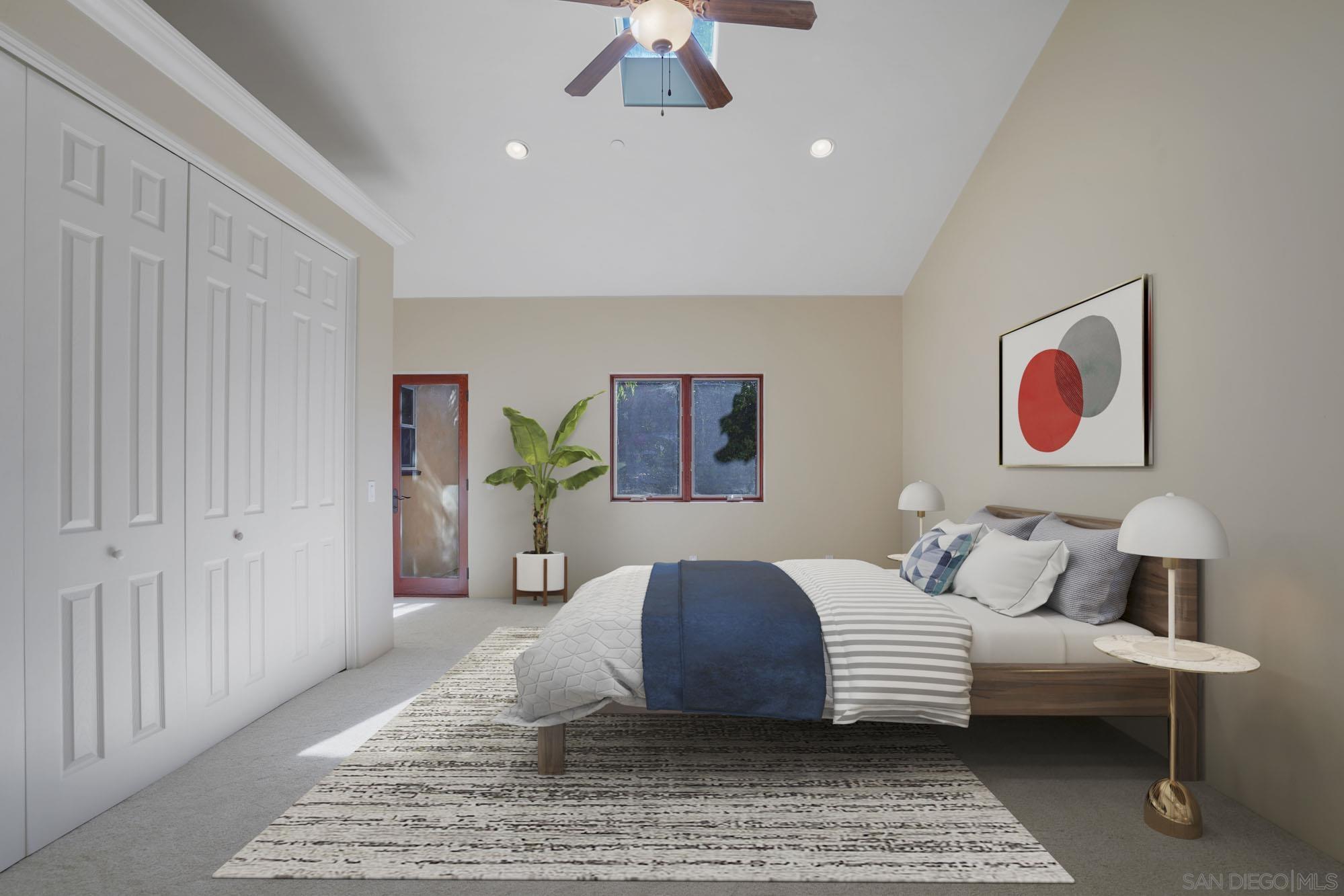 5352 Camino Jasmine Bonsall, CA 92003 - Photo 33 of 68 a bedroom with a bed and a chandelier