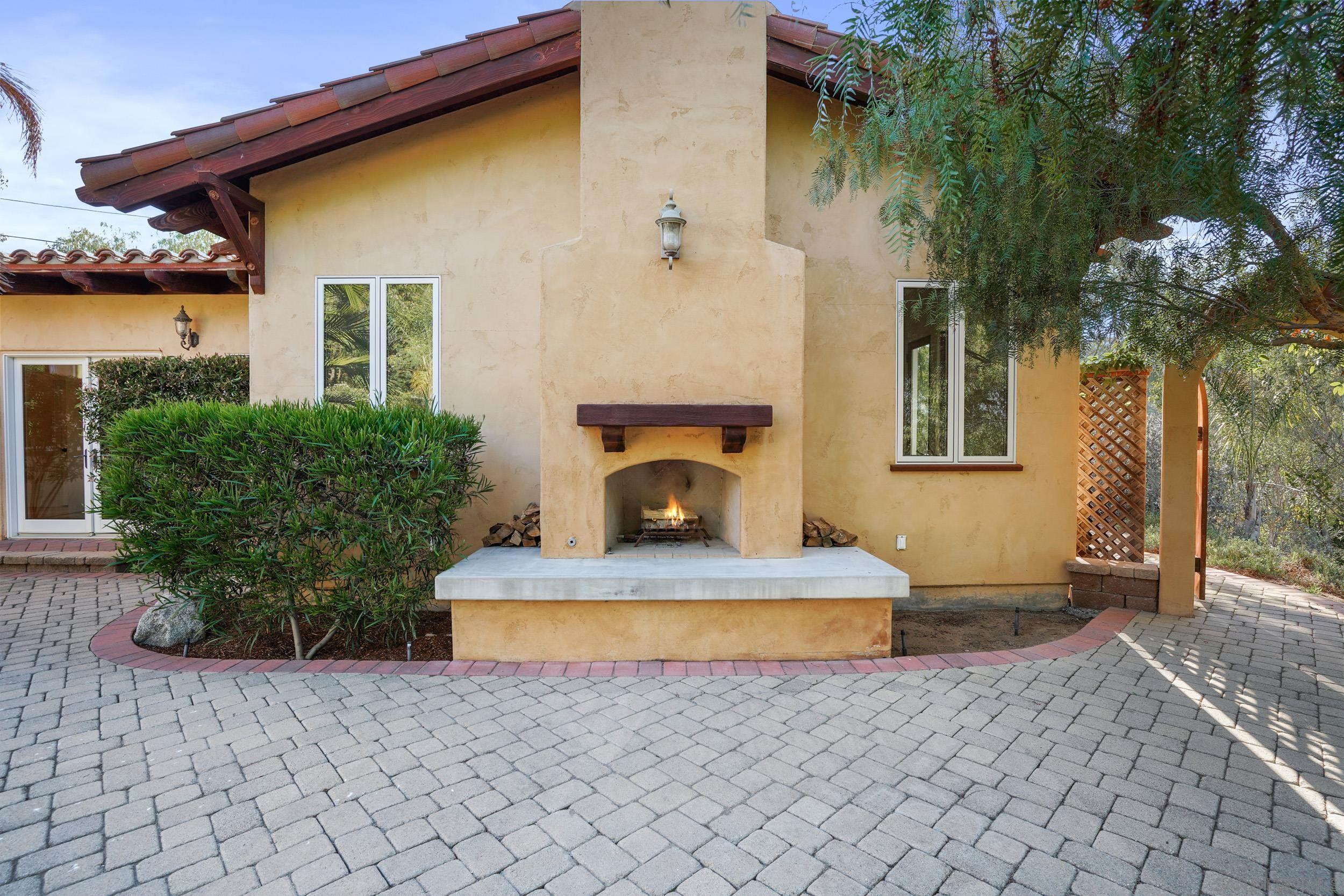 5352 Camino Jasmine Bonsall, CA 92003 - Photo 36 of 68 a front view of a house with a garden