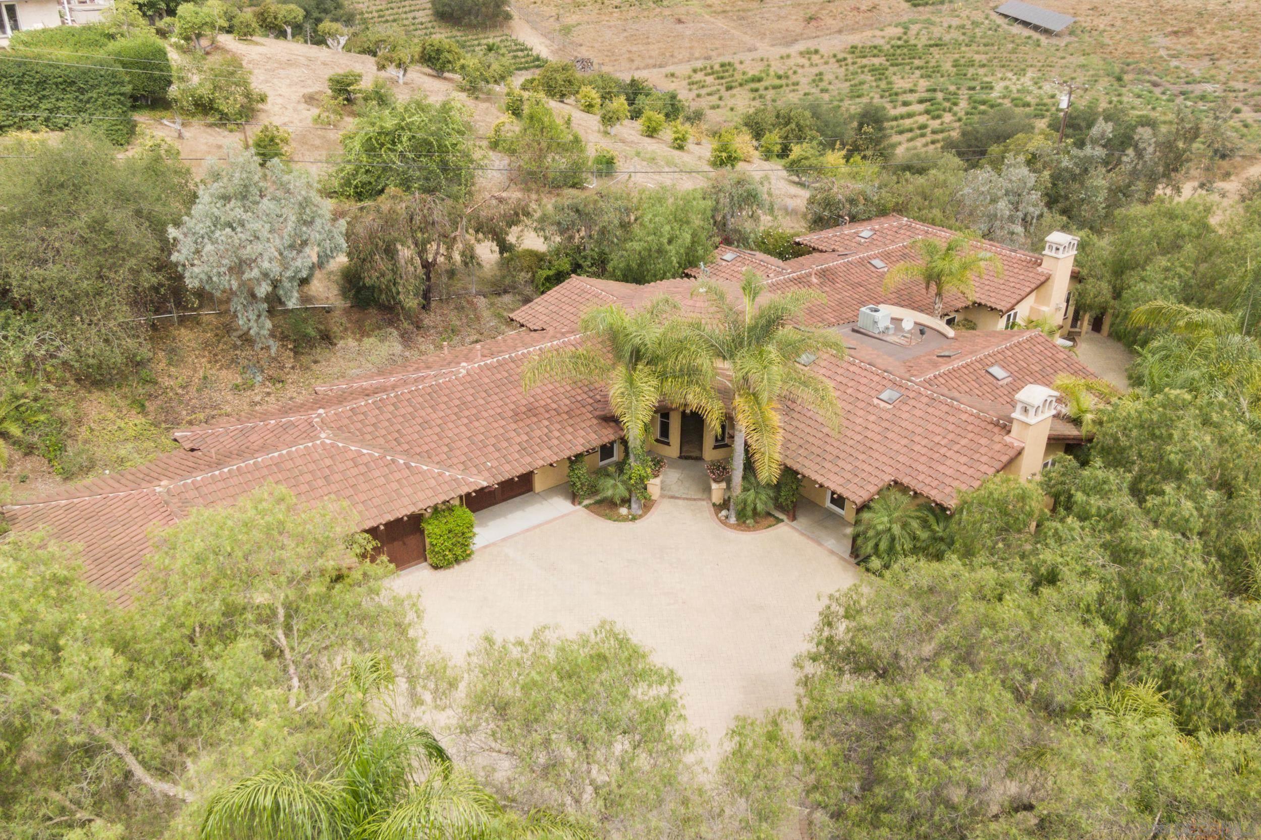 5352 Camino Jasmine Bonsall, CA 92003 - Photo 43 of 68 an aerial view of residential houses with outdoor space