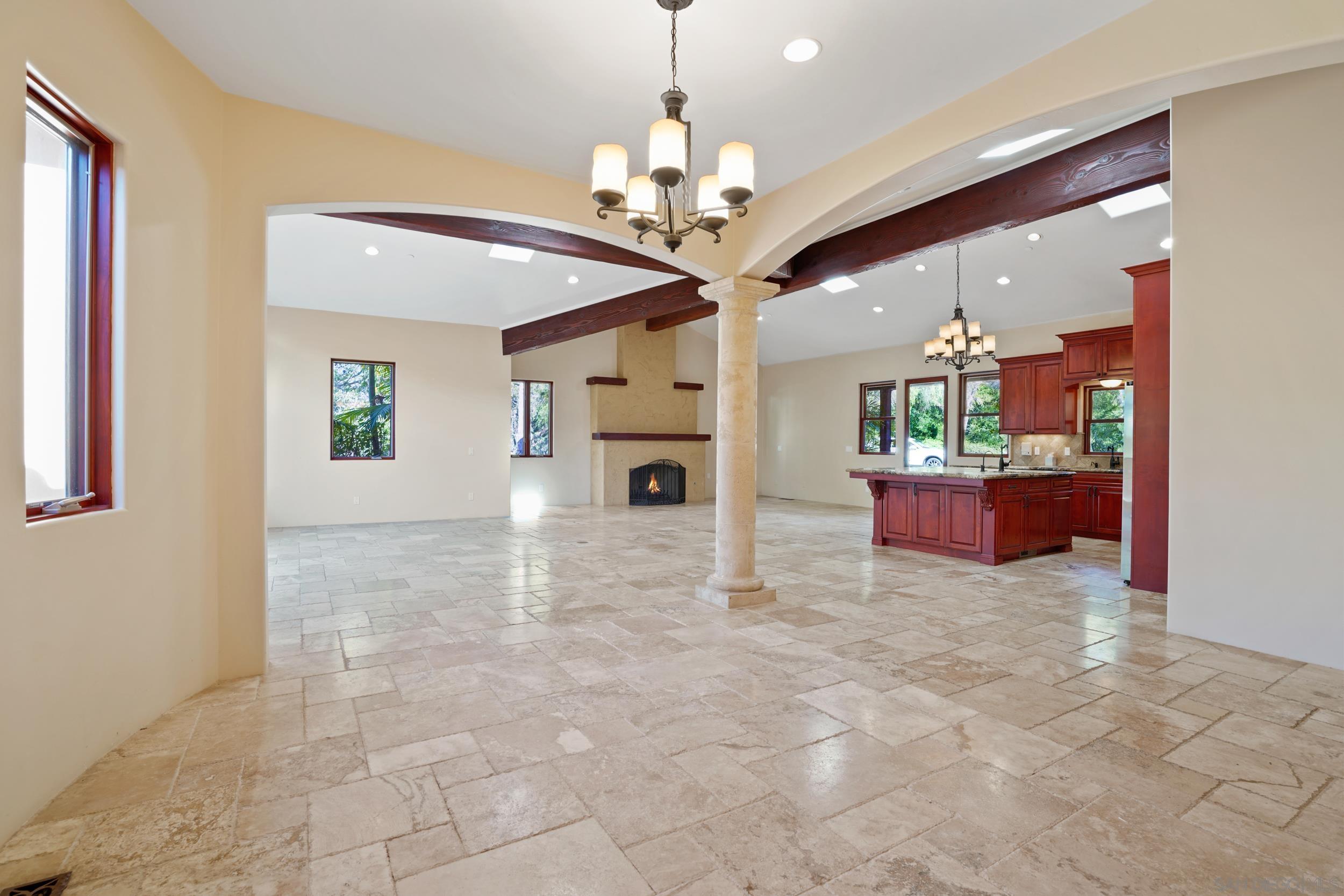 5352 Camino Jasmine Bonsall, CA 92003 - Photo 47 of 68 a view of a livingroom with a chandelier furniture and windows