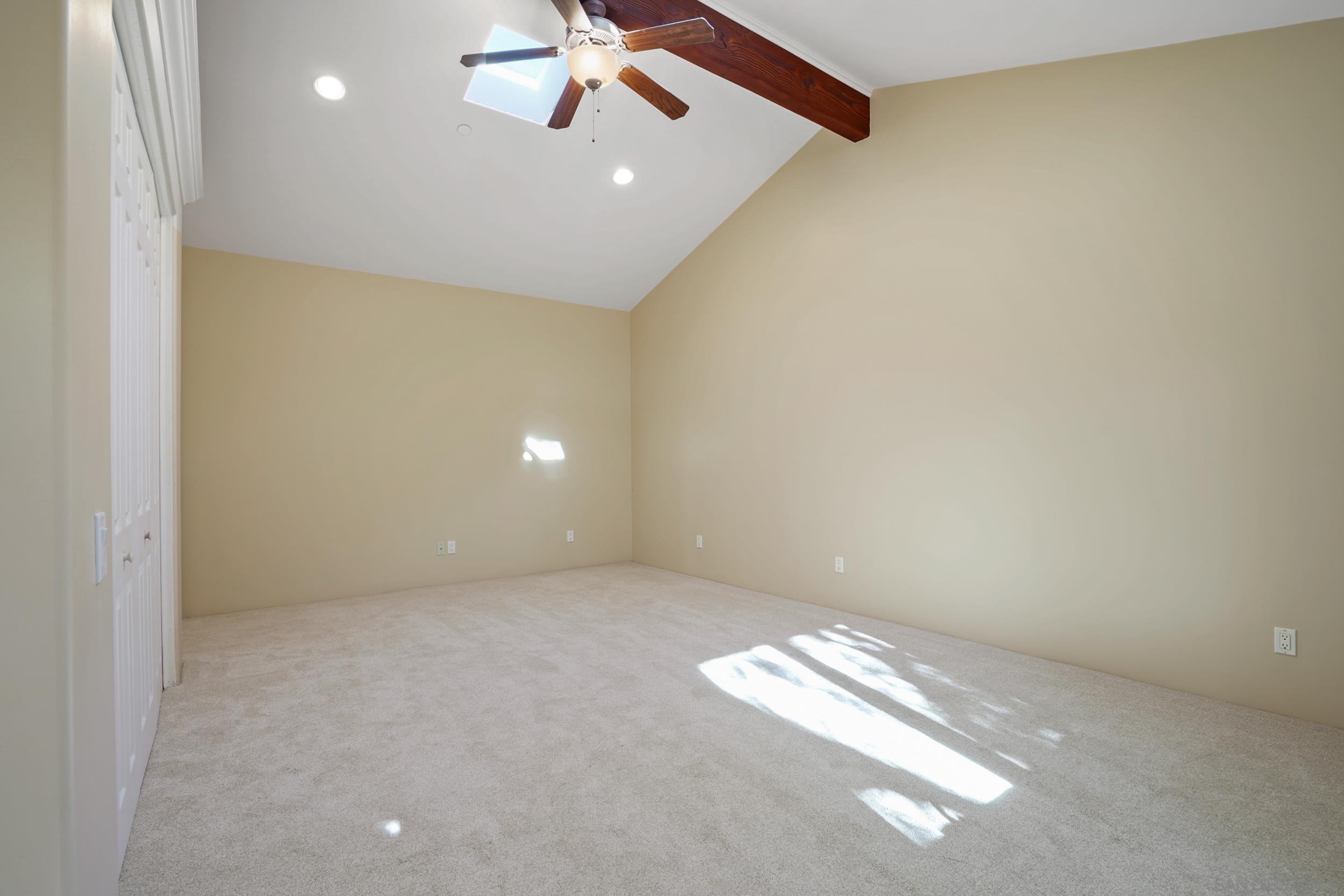 5352 Camino Jasmine Bonsall, CA 92003 - Photo 58 of 68 en empty room with windows and fan