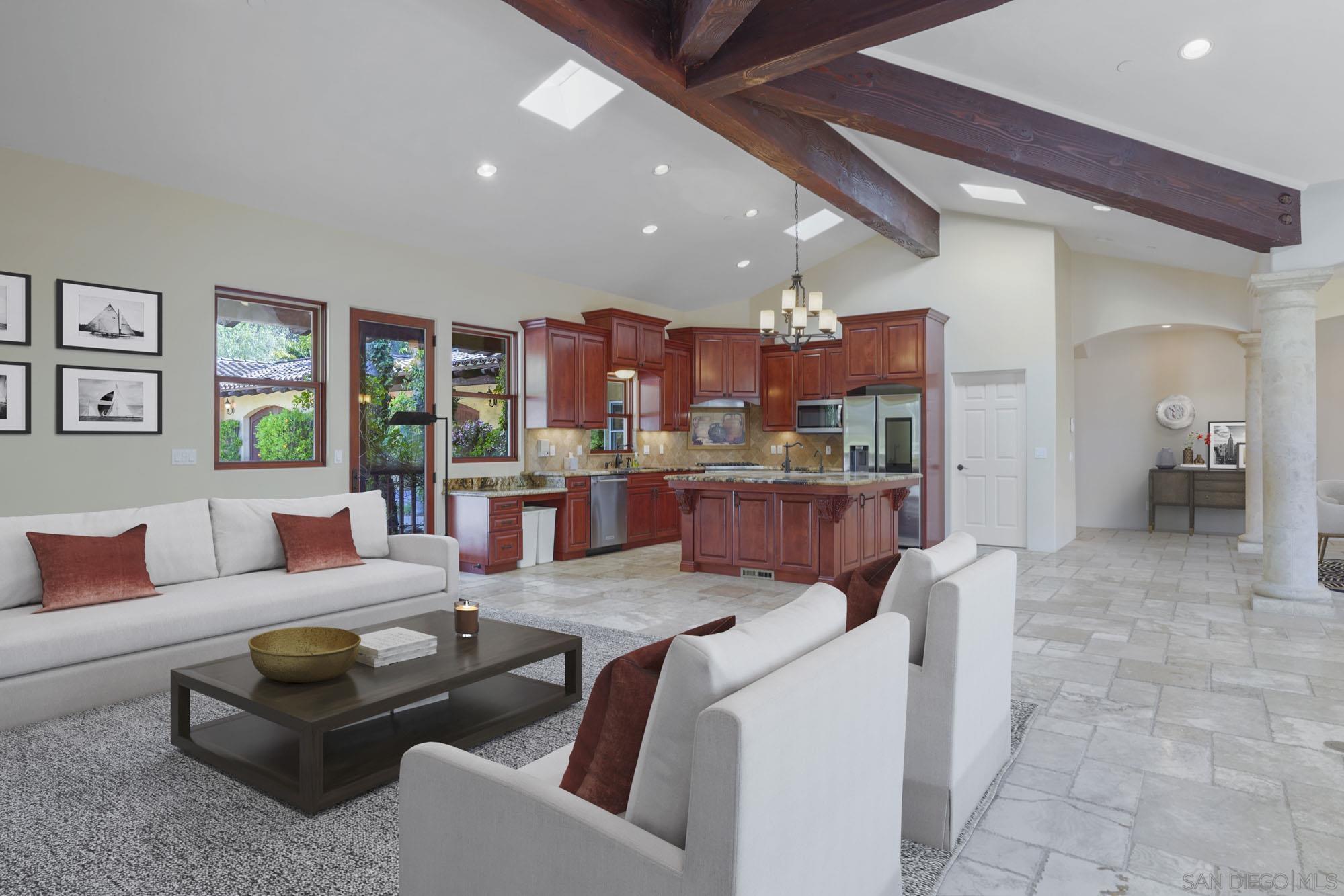 5352 Camino Jasmine Bonsall, CA 92003 - Photo 8 of 68 a living room with furniture and a view of kitchen