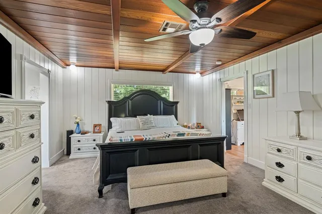 a living room with granite countertop furniture and fireplace