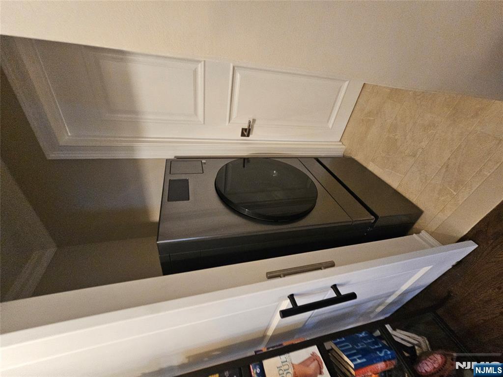 63-69 Rome Street Newark, NJ 07105 - Photo 14 of 14 a utility room with dryer and washer