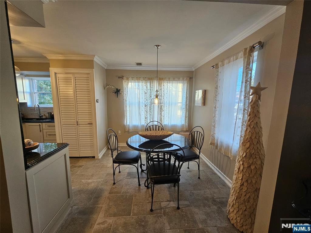 63-69 Rome Street Newark, NJ 07105 - Photo 6 of 14 a dining room with furniture and window