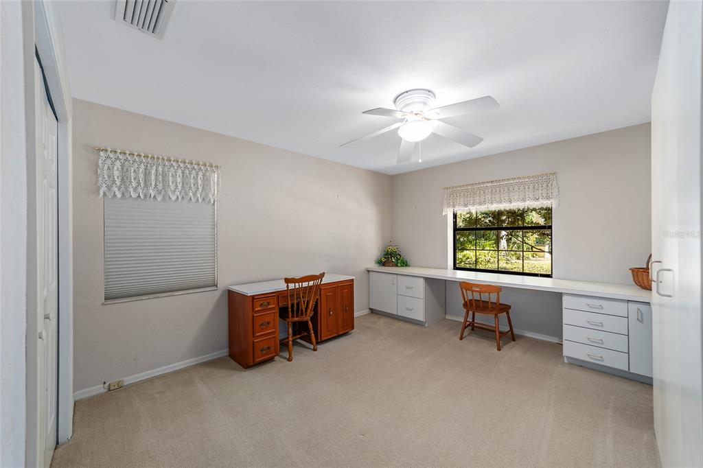 3590 Southwest 24th Avenue Road Ocala, FL 34471 - Photo 36 of 76 Third Bedroom, Hobby room or Home office. Complete with Full Closet, Built in Shelves, Desk, and MURPHY BED to save space. You can have your hobby room and double as a guest bedroom when needed. PERFECT for the Holidays.