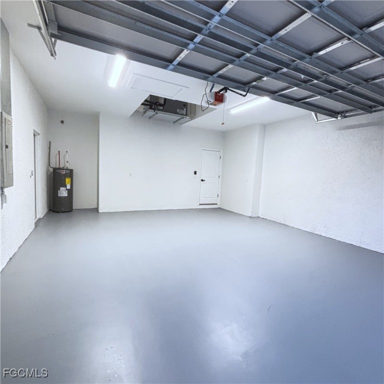 113 Monroe Avenue Lehigh Acres, FL 33936 - Photo 21 of 24 a view of a room with an empty space