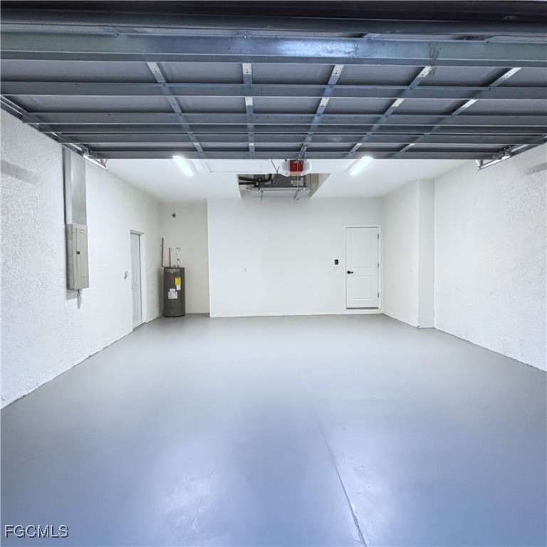 113 Monroe Avenue Lehigh Acres, FL 33936 - Photo 22 of 24 a view of a room with wooden walls