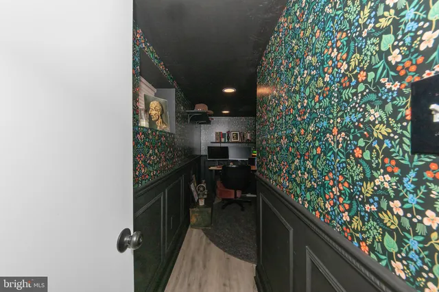 a room with wine cabinets and a table