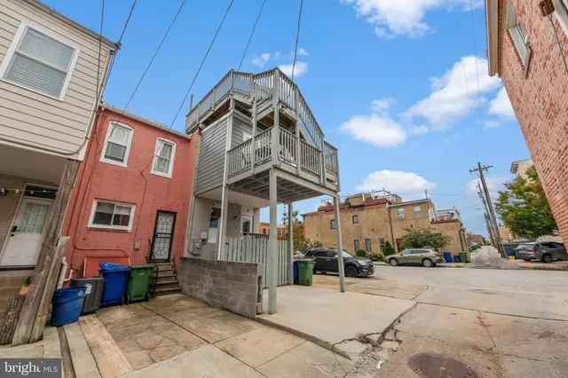 a view of a building with a street