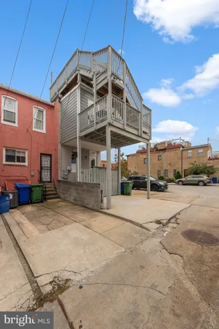 a front view of building with street