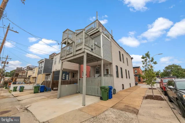 a car parked in front of a house