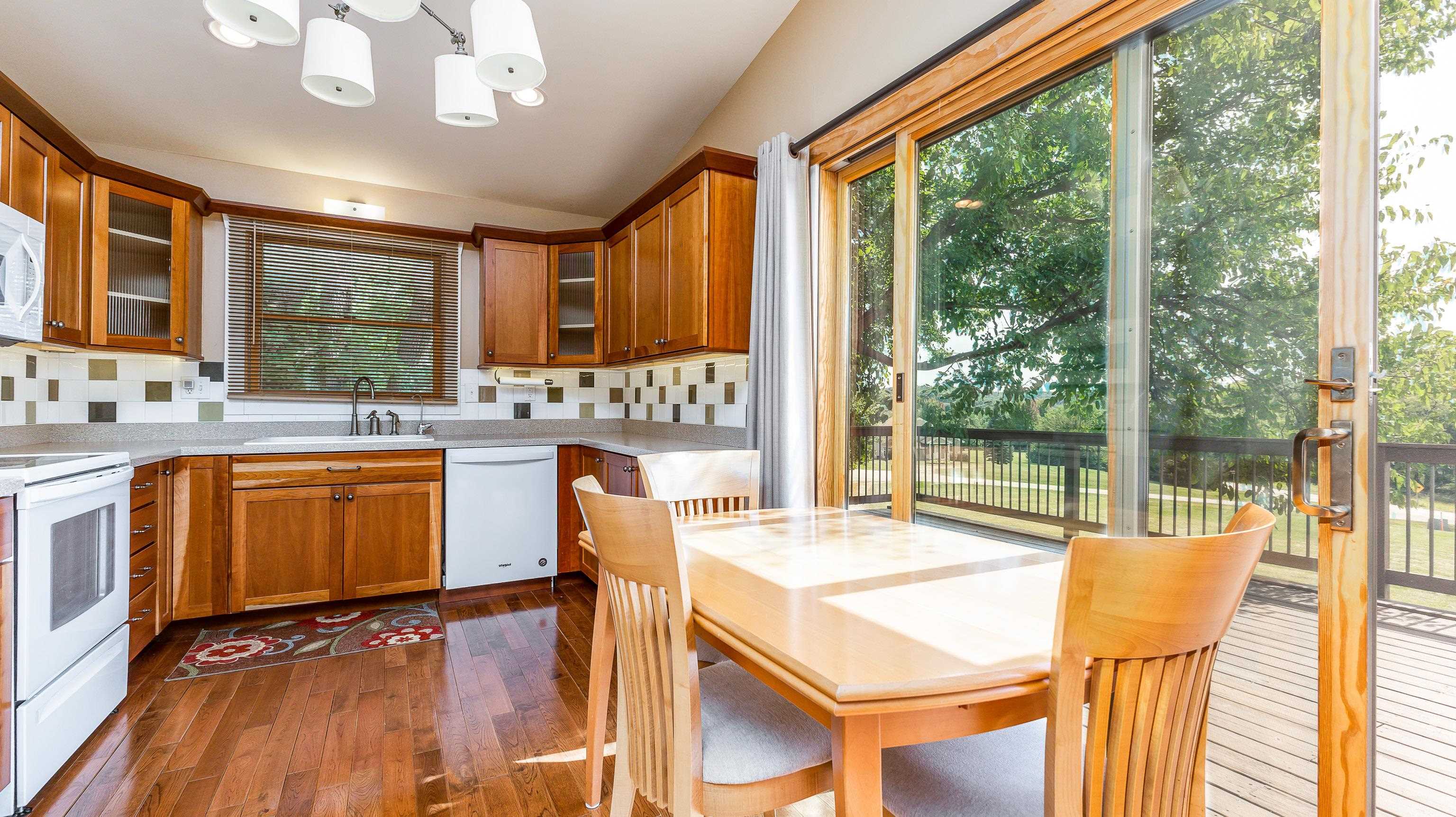 2 Sunbow Path Galena, IL 61036 - Photo 12 of 37 a view of a dining room with furniture window and wooden floor